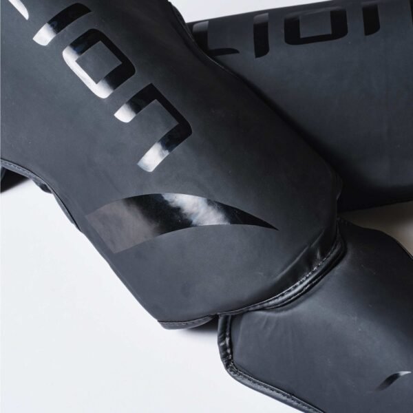 Protège tibias ELION EXTRAVAGANT Noir/Noir Protège tibias ELION EXTRAVAGANT Noir/Noir