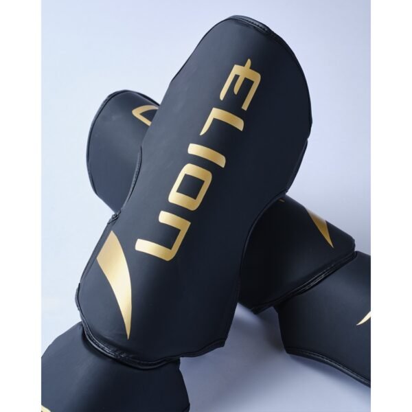 Protège tibias ELION EXTRAVAGANT Noir/Or