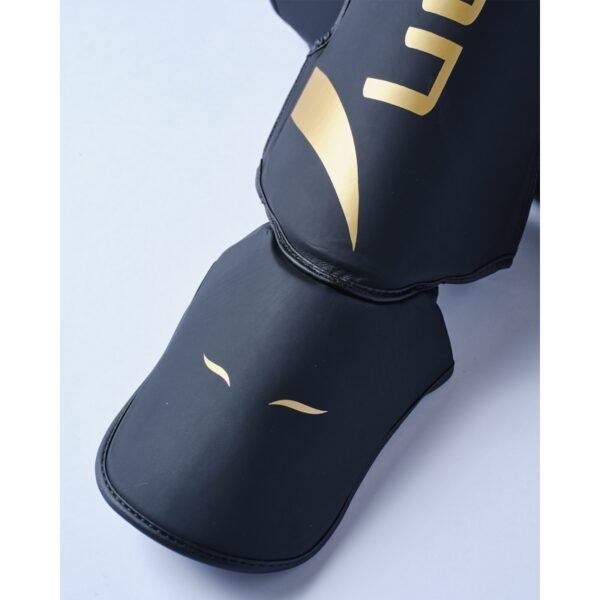 Protège tibias ELION EXTRAVAGANT Noir/Or