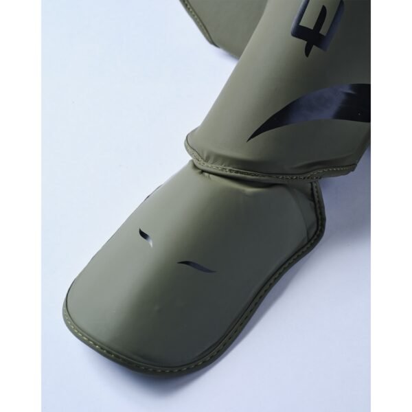 Protège tibias ELION EXTRAVAGANT Kaki/Noir